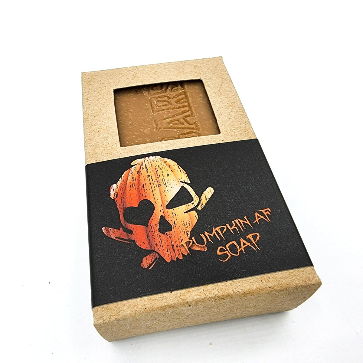 Pumpkin AF Soap in kraft paper box with skull and bones graphic on black band